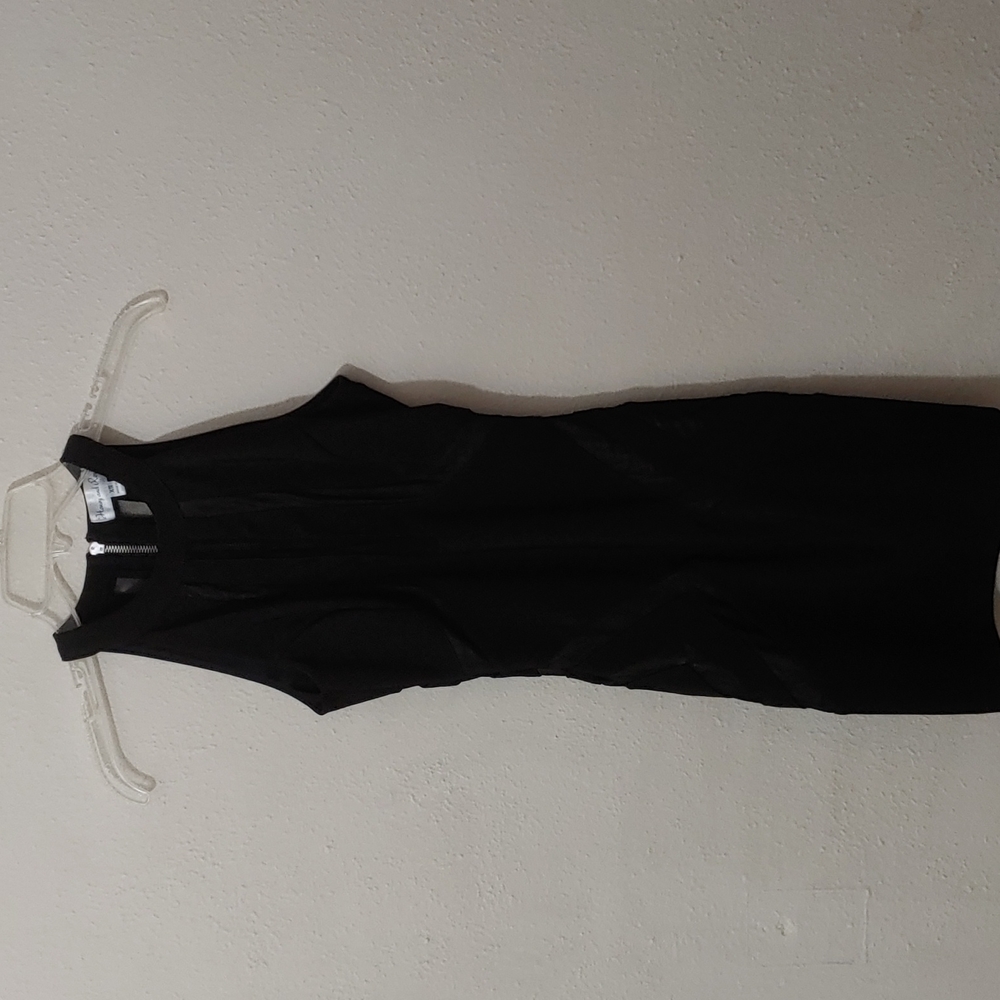 Honey and Rosie Women's Size X Small Little Black Dress with mesh cutouts.